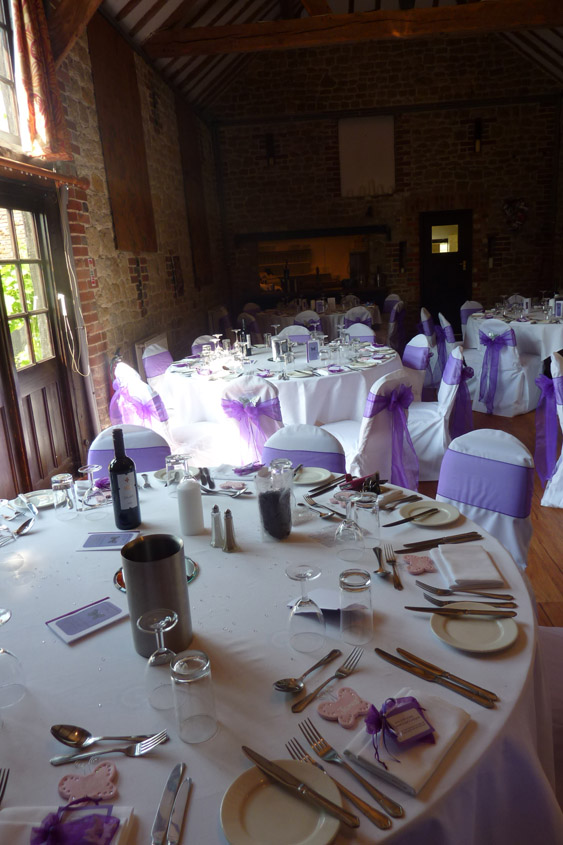  table swags and silver butterflies WEDDING CHAIR COVERS PURPLE SASHES